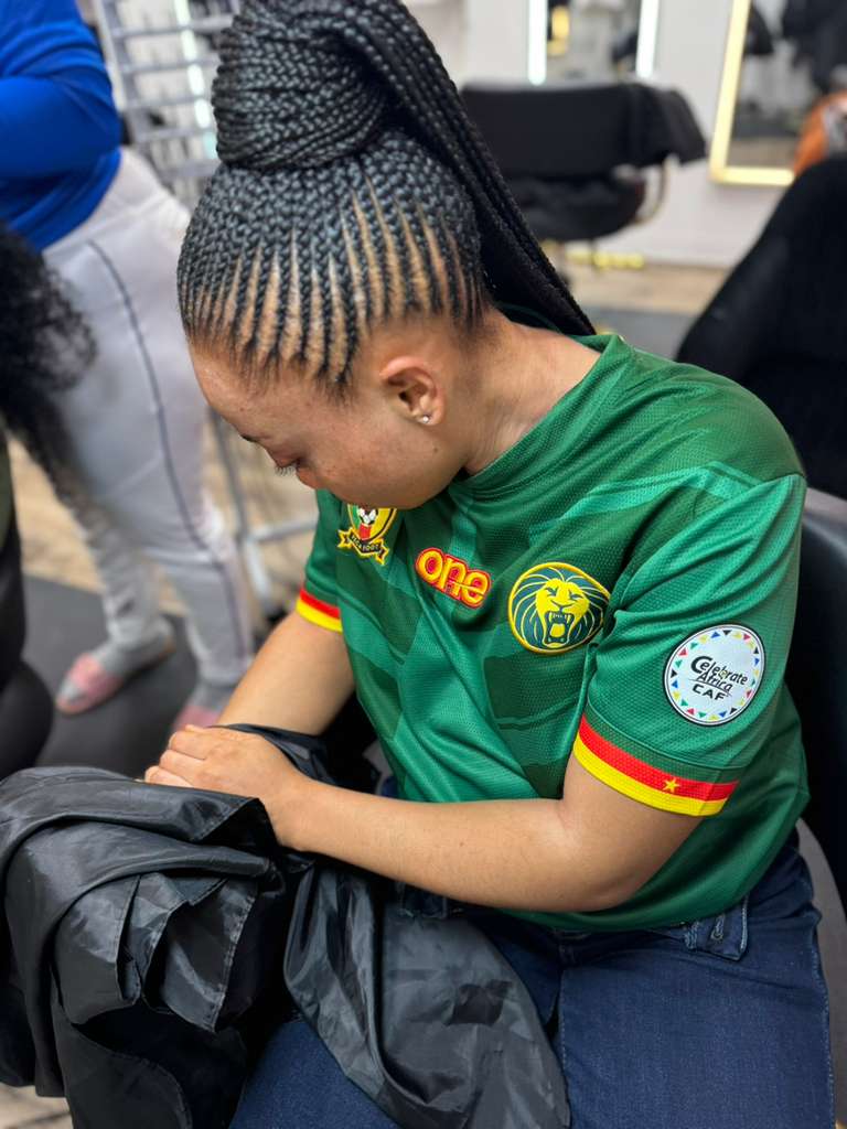 Client protective hairstyle by Melanie Hair Braiding